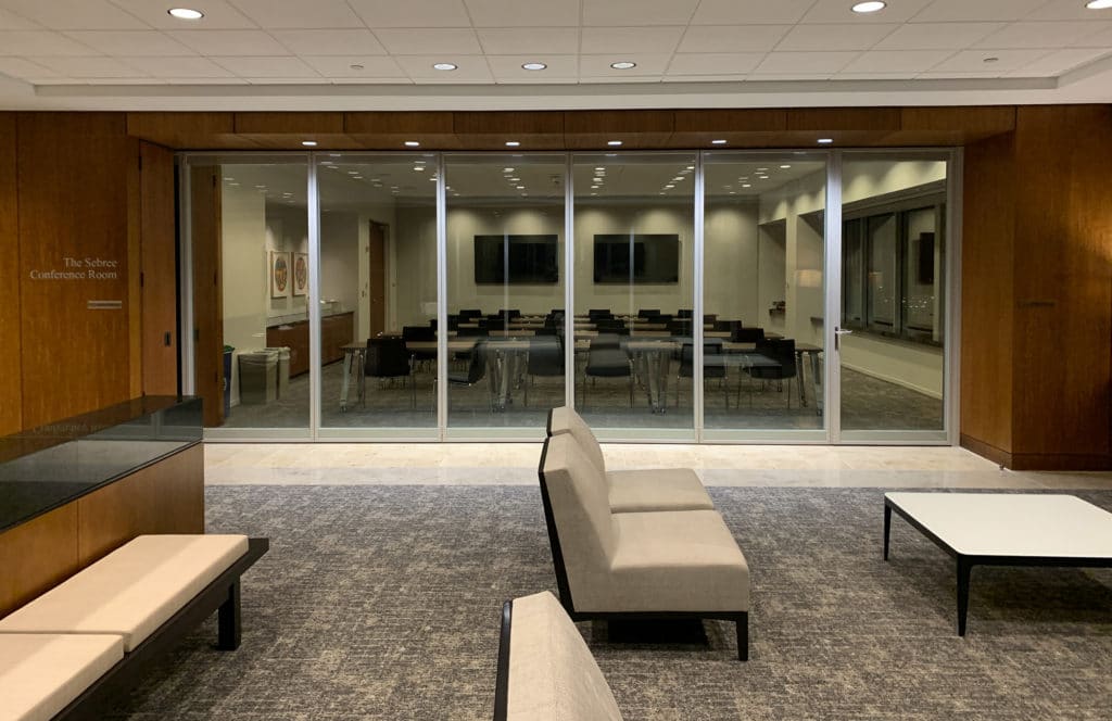 Modernfold Acousti-Clear glass walls with door closed.