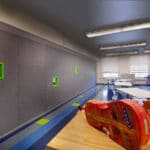 Paired panel operable walls in a classroom.
