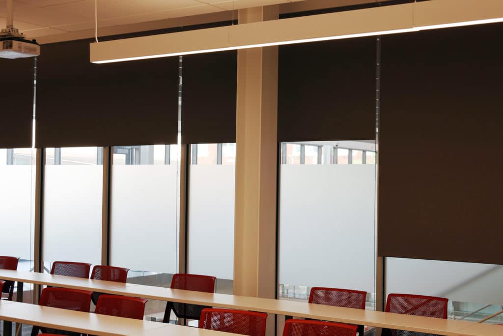 Commercial rollershades installed in a Donnelly College classroom