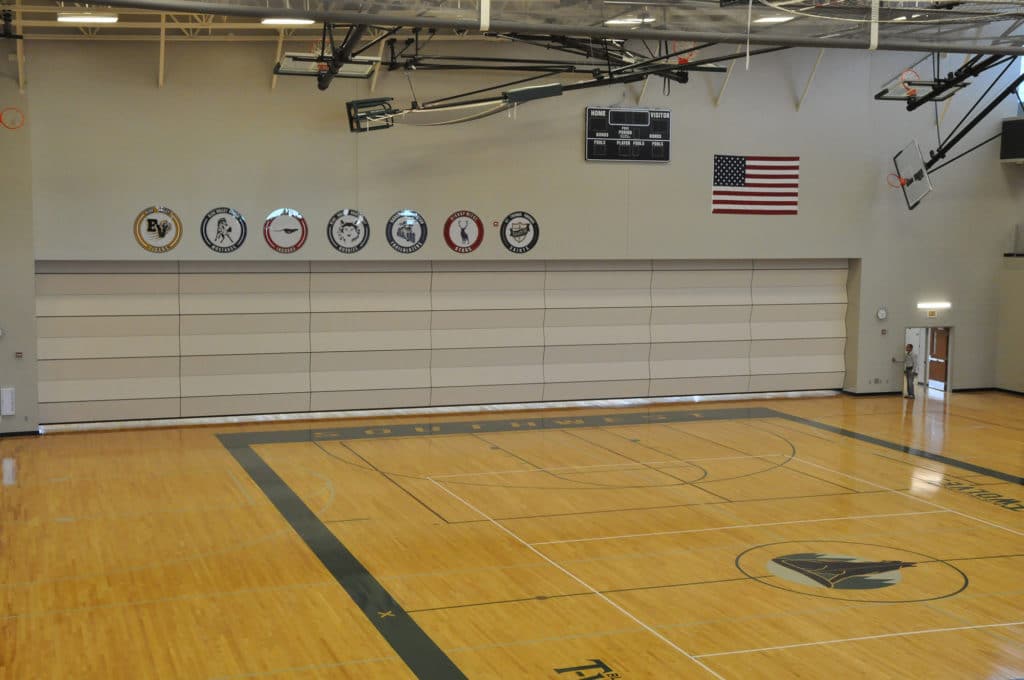 Skyfold operable wall divides the Blue Valley Southwest High School gym.
