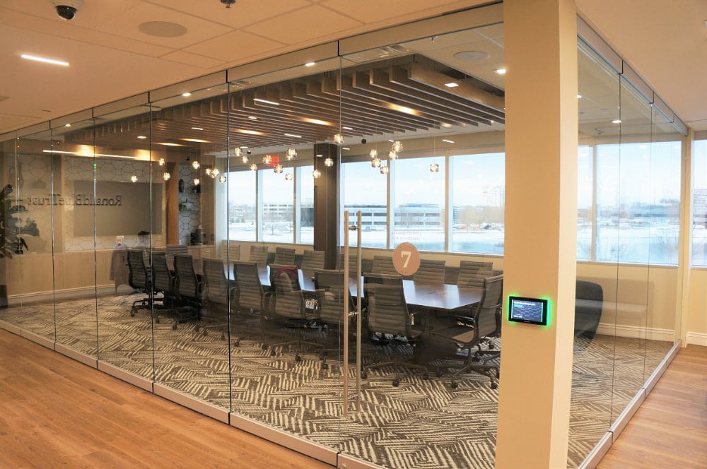 Modernfold DRS glass operable walls in an office conference room.