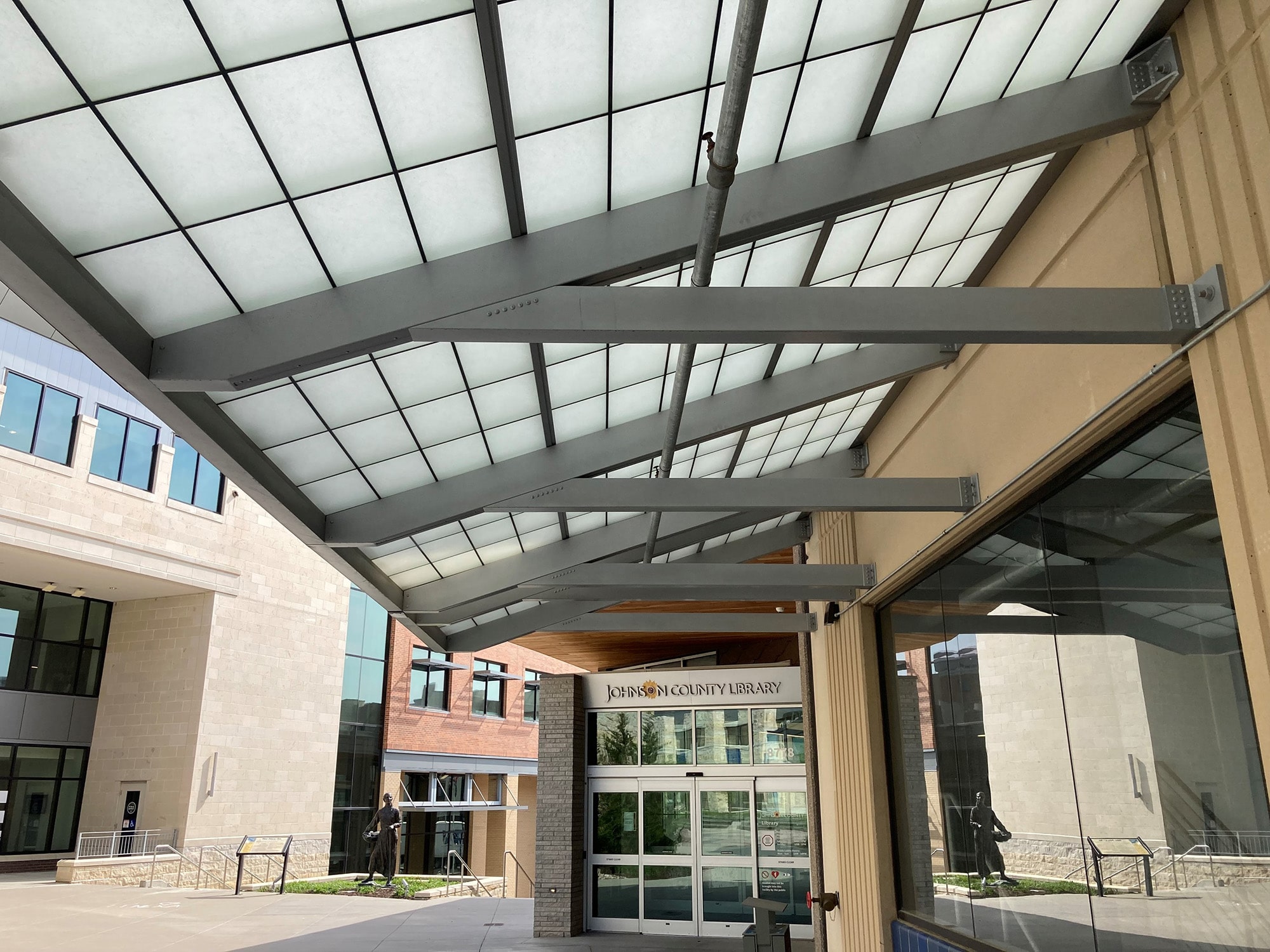 Lenexa City Center Library entrance covered by translucent canopy.