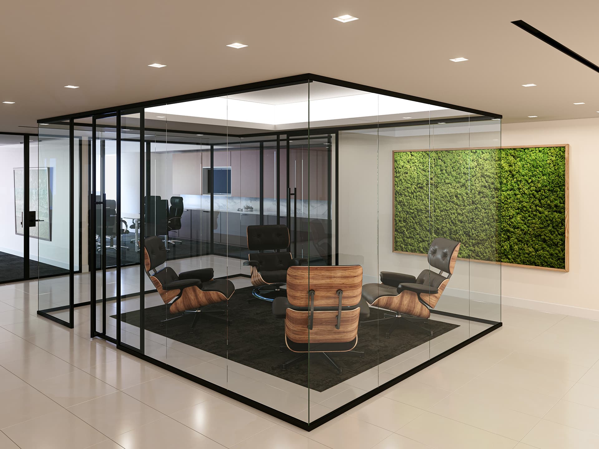 Meeting area created by glass walls inside an office building.