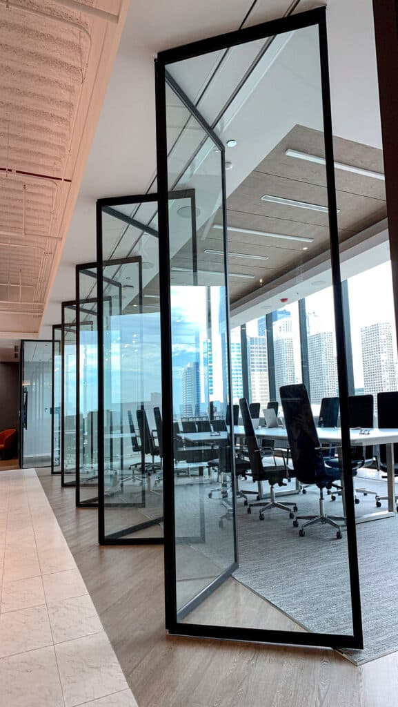 Office conference room with movable glass walls.