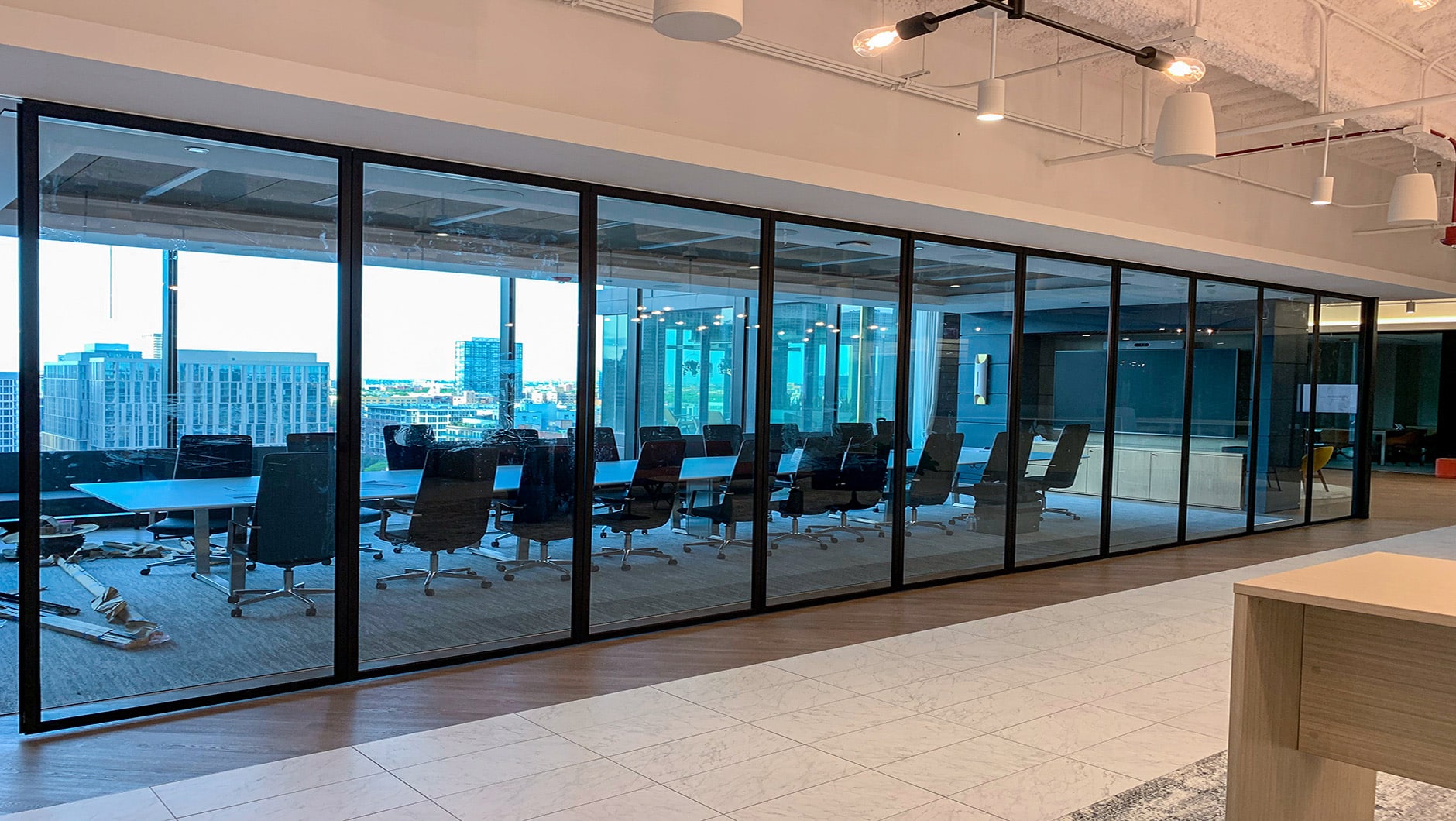 Office conference room with glass walls.