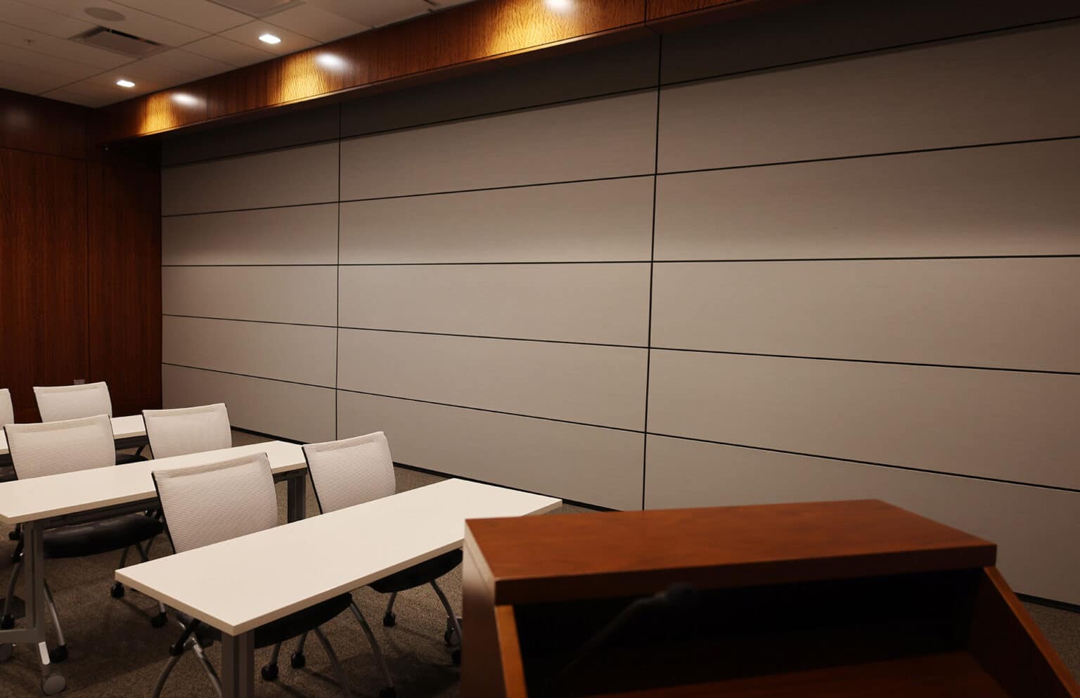 Folding wall separating classroom in half.