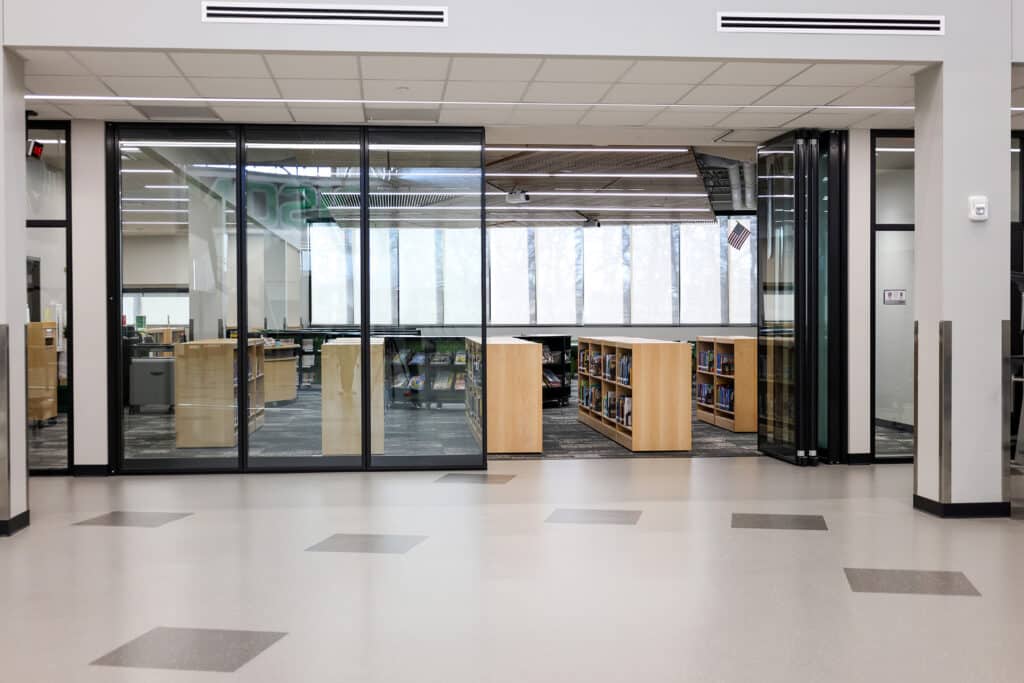 Glass operable wall in school library.